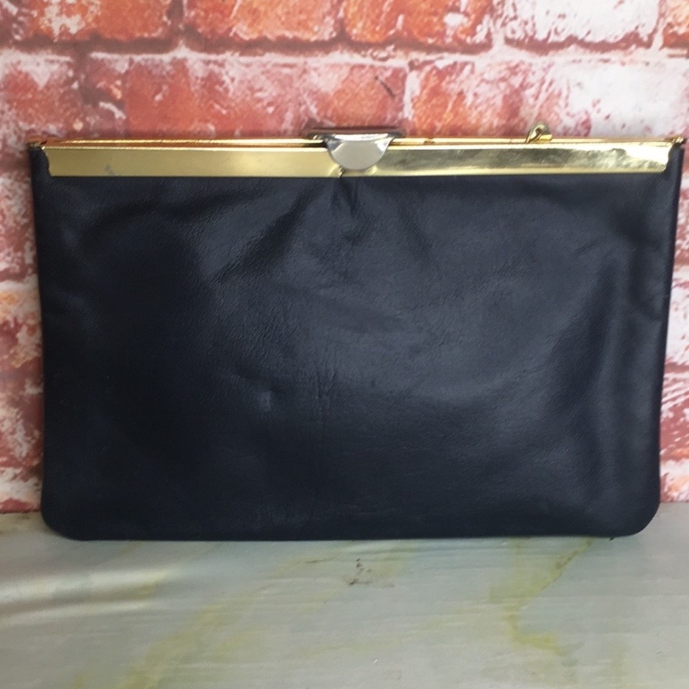 Vintage MCM Etra Black Framed 
Leather Clutch